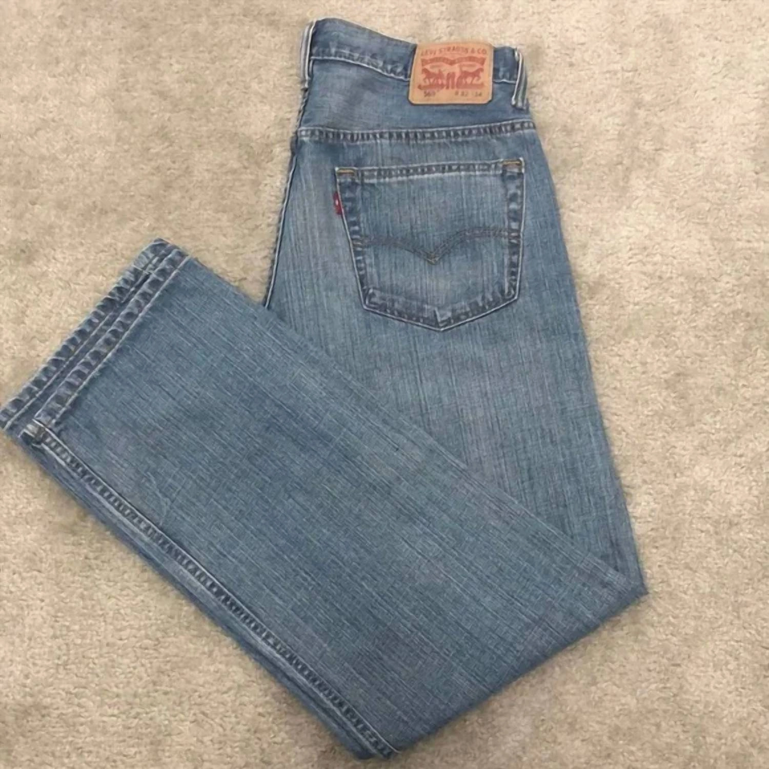 569 Loose Straight Jeans In Washed Blue