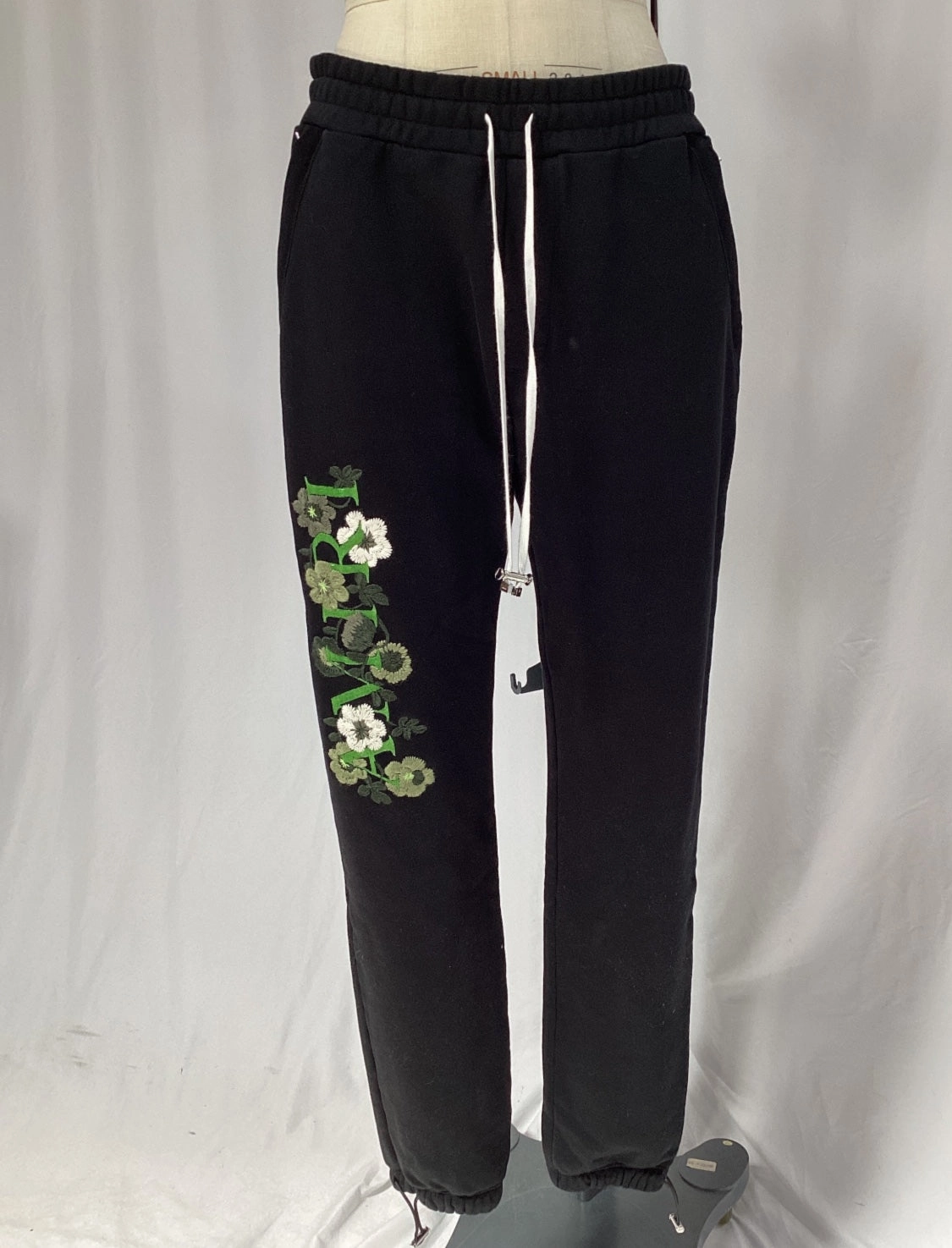 Amiri Logo-Embroidered Sweatpants in Black Cotton
