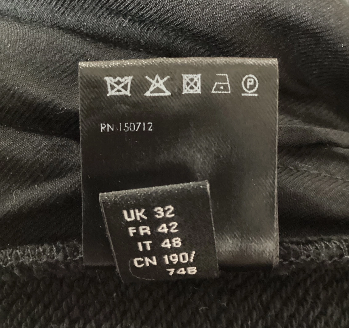 Amiri Logo-Embroidered Sweatpants in Black Cotton