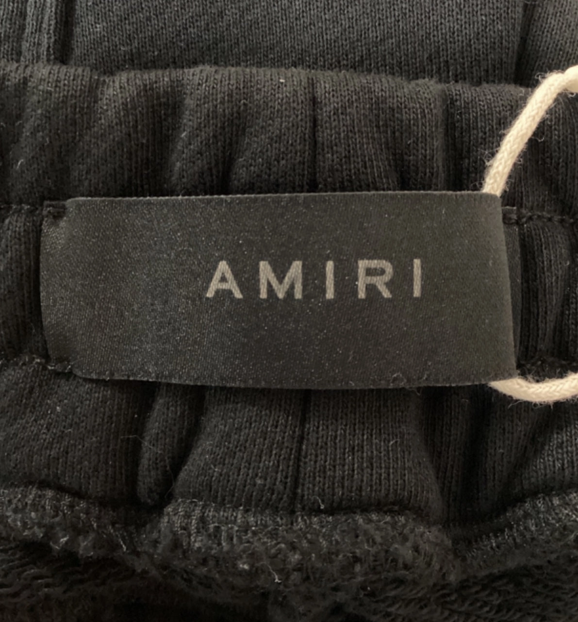 Amiri Logo-Embroidered Sweatpants in Black Cotton