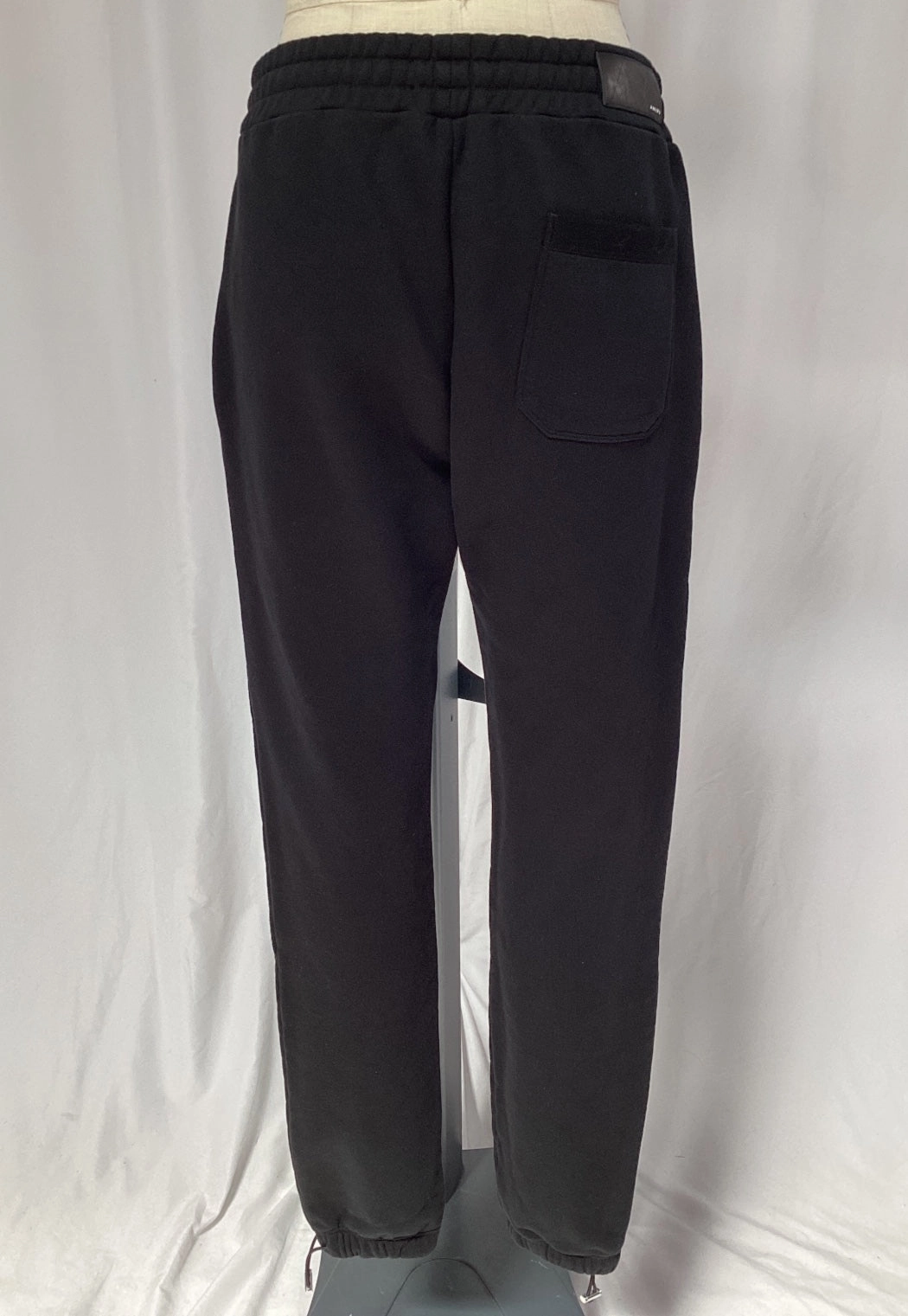 Amiri Logo-Embroidered Sweatpants in Black Cotton
