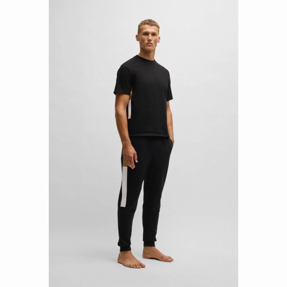 Cotton-terry tracksuit bottoms with contrast side panels