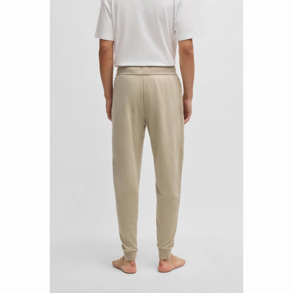 Drawcord tracksuit bottoms in cotton terry with logo print