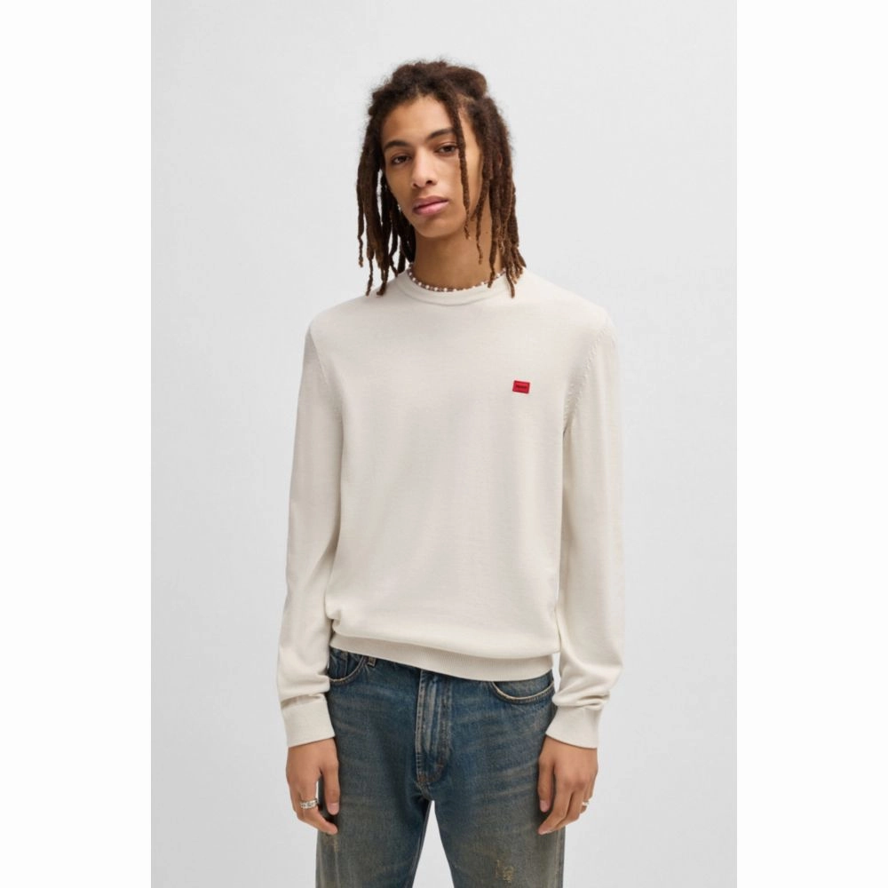 Knitted cotton sweater with red logo label