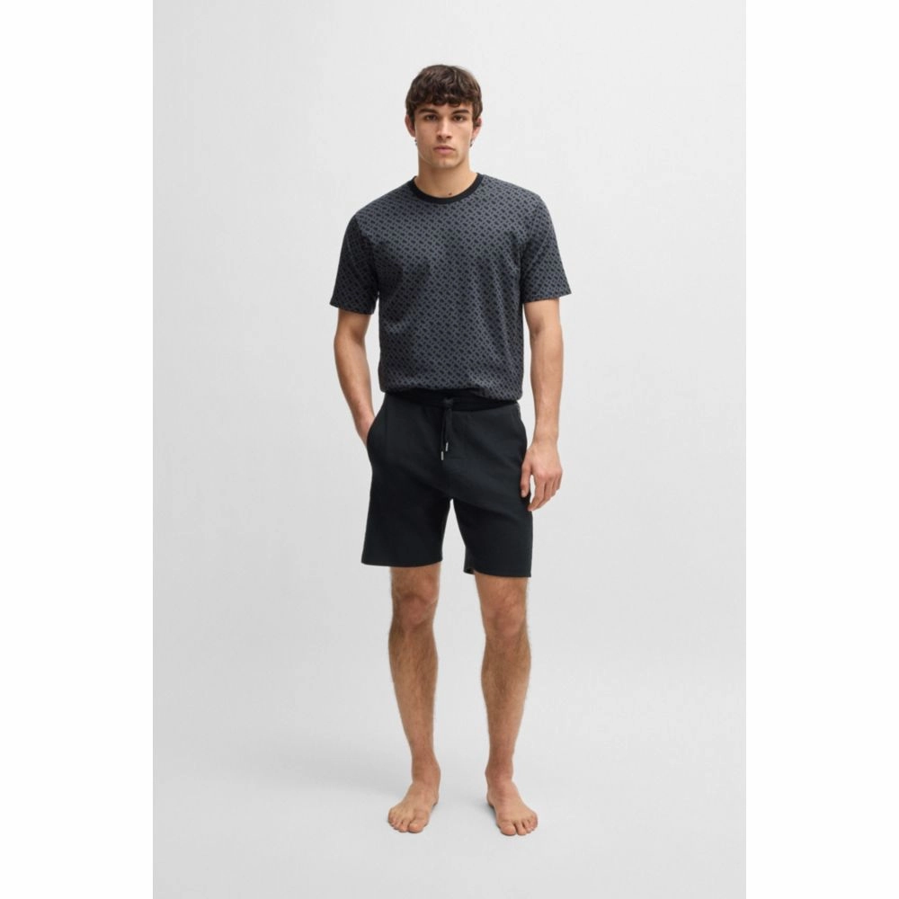 shorts with monogram-pattern panels