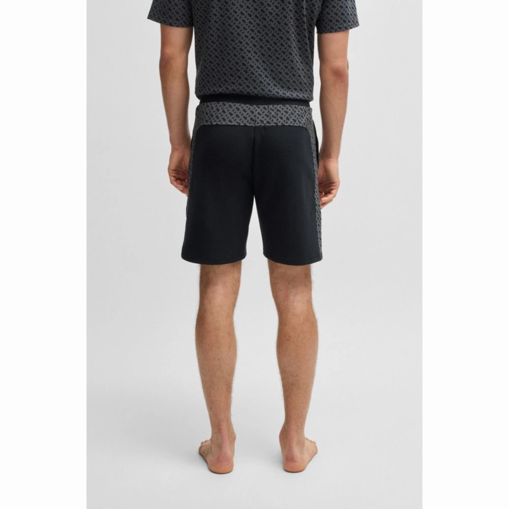 shorts with monogram-pattern panels
