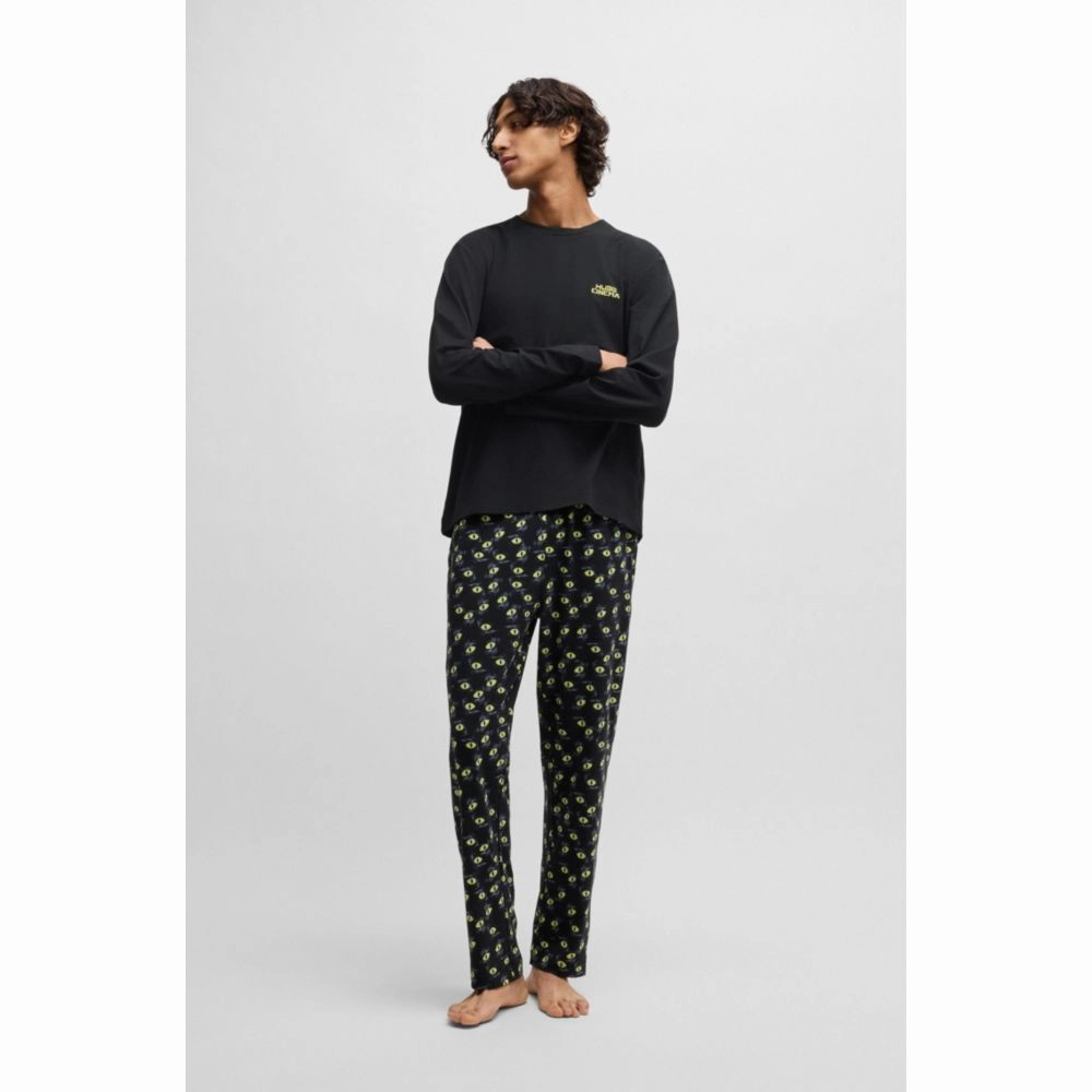 Stretch-cotton pajamas with 70s film graphics