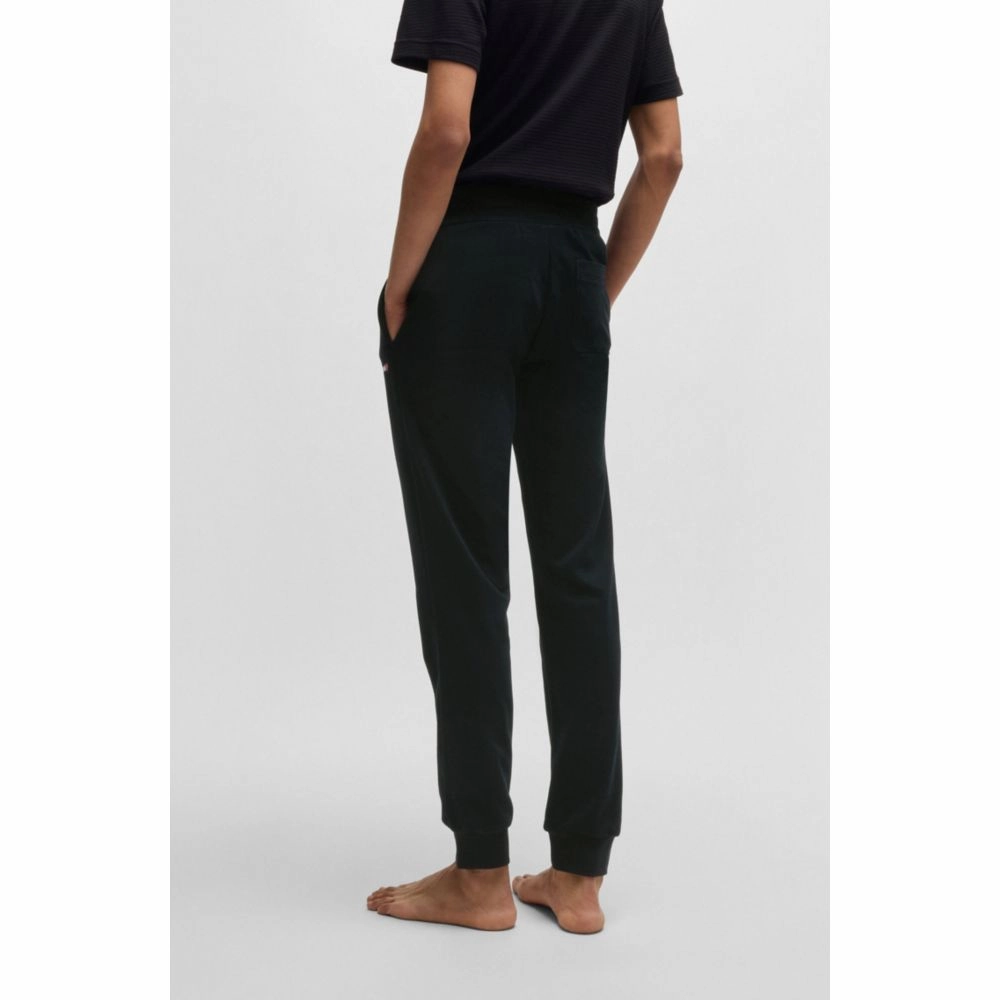tracksuit bottoms with heart logo