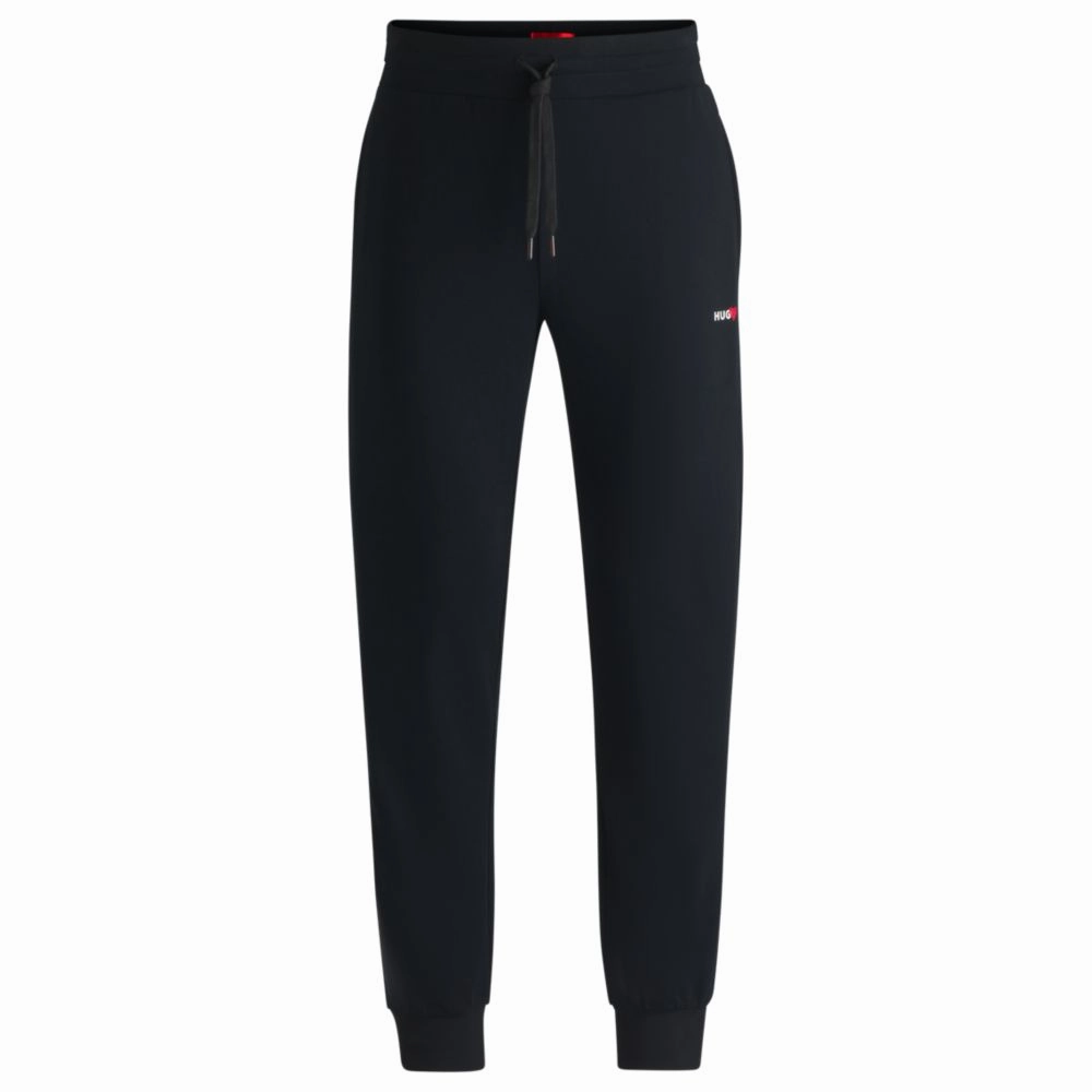 tracksuit bottoms with heart logo