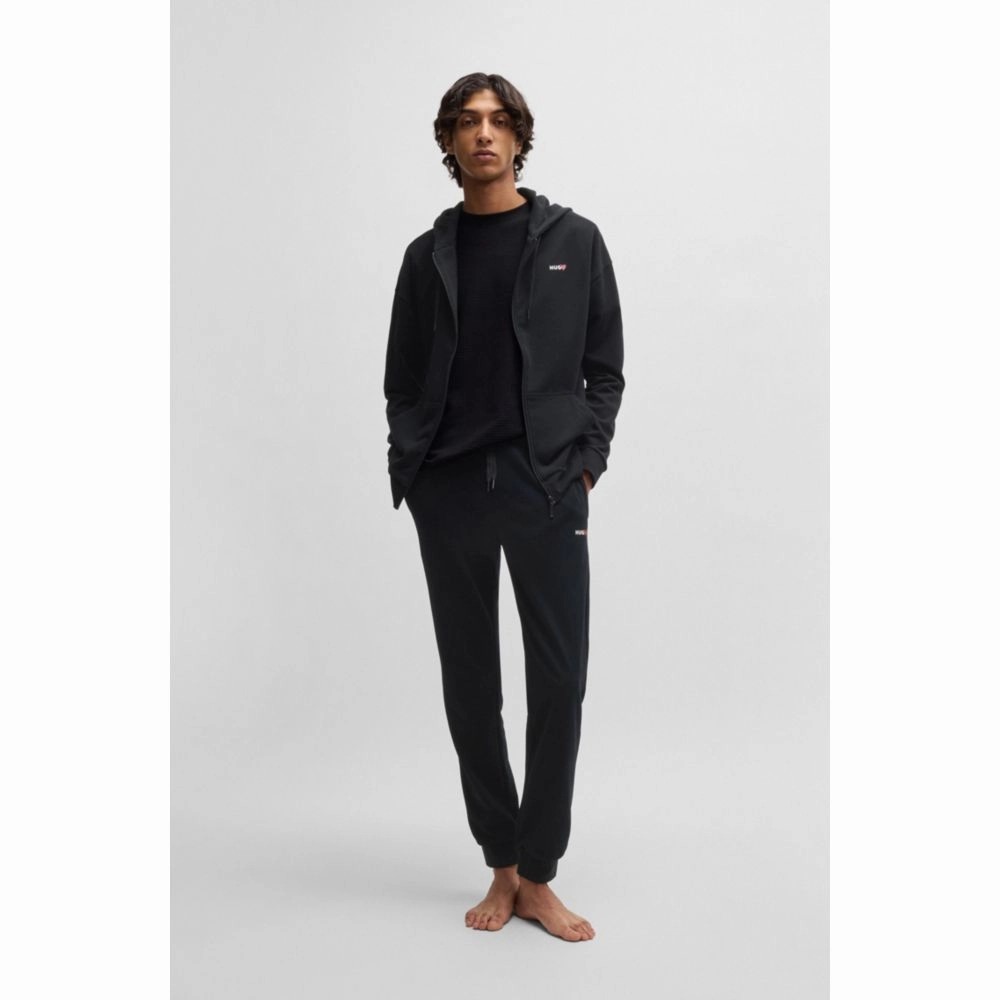 tracksuit bottoms with heart logo