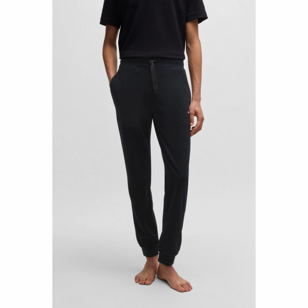 tracksuit bottoms with heart logo