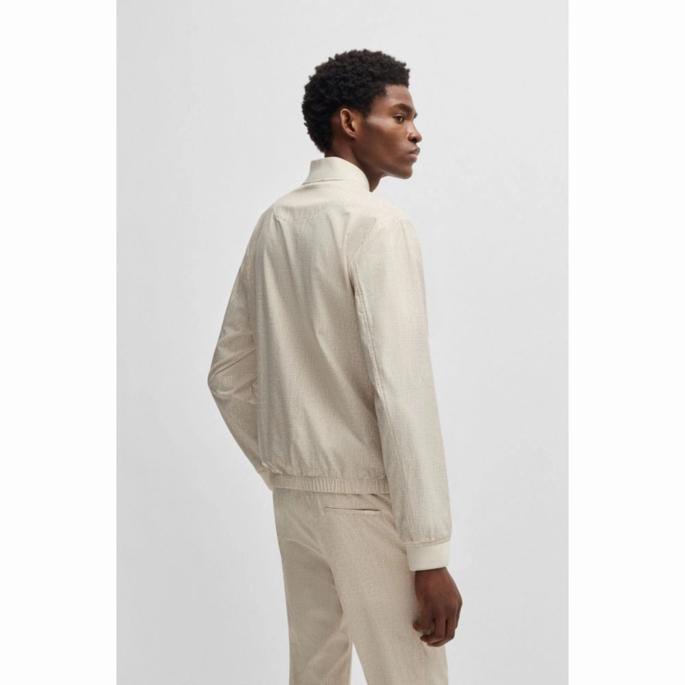 Water-repellent packable jacket with two-way zip