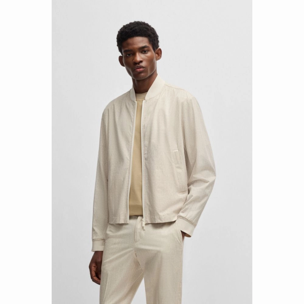 Water-repellent packable jacket with two-way zip
